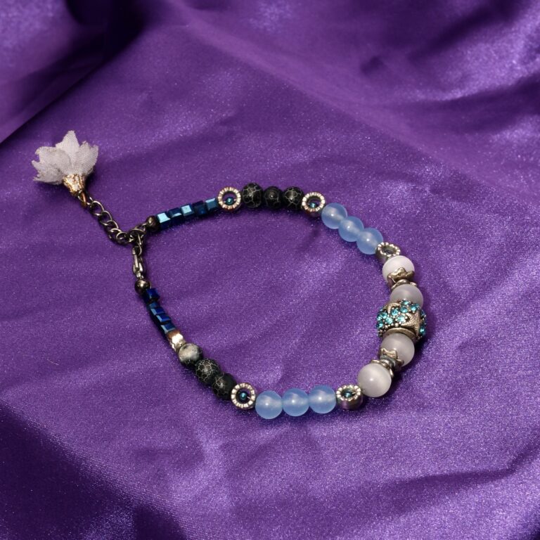 Energetska narukvica ručne izrade sa srebrnom zvezda-perlom, cat’s eye perlama, akvamarinom, crnim ahatom i swarovski detaljima